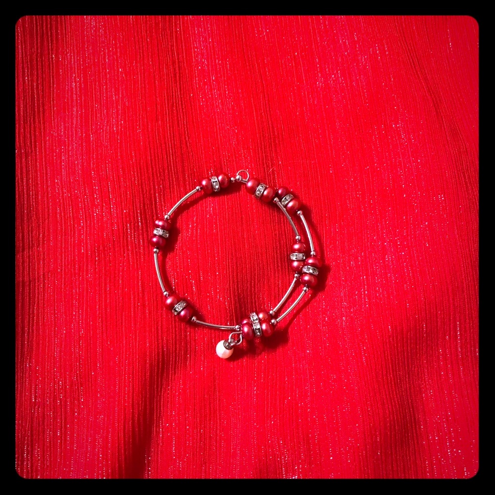 Cranberry colored beads with a real pearl